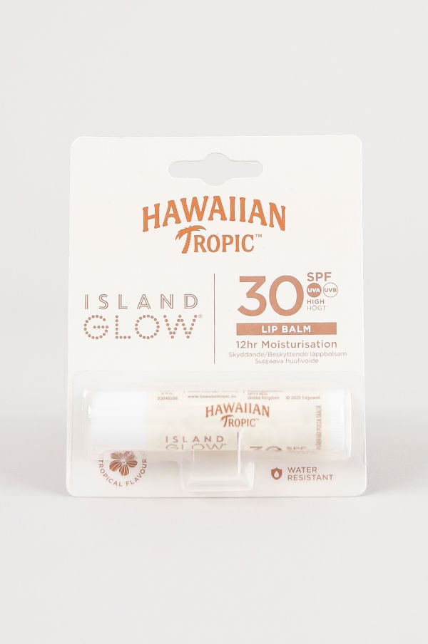 Hawaiian Tropic Island Glow läppbalsam med SPF 30, ger 12 timmars återfuktning och skydd mot UVA/UVB-strålar. Vattenresistent och med tropisk smak.