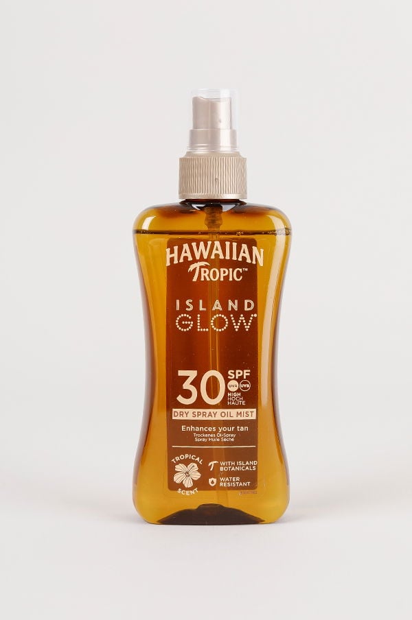 Hawaiian Tropic Island Glow torr sprayolja med SPF 30, designad för att förbättra solbrännan och ge en tropisk doft. Produkten är vattentålig och innehåller växtbaserade ingredienser.