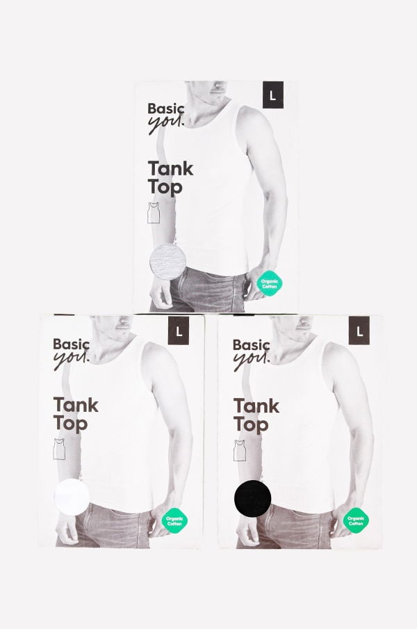 Tre förpackningar med Basic You tank tops i storlek L, i färgerna vit, svart och grå. Kläderna är tillverkade av ekologisk bomull och passar perfekt för både vardag och träning.