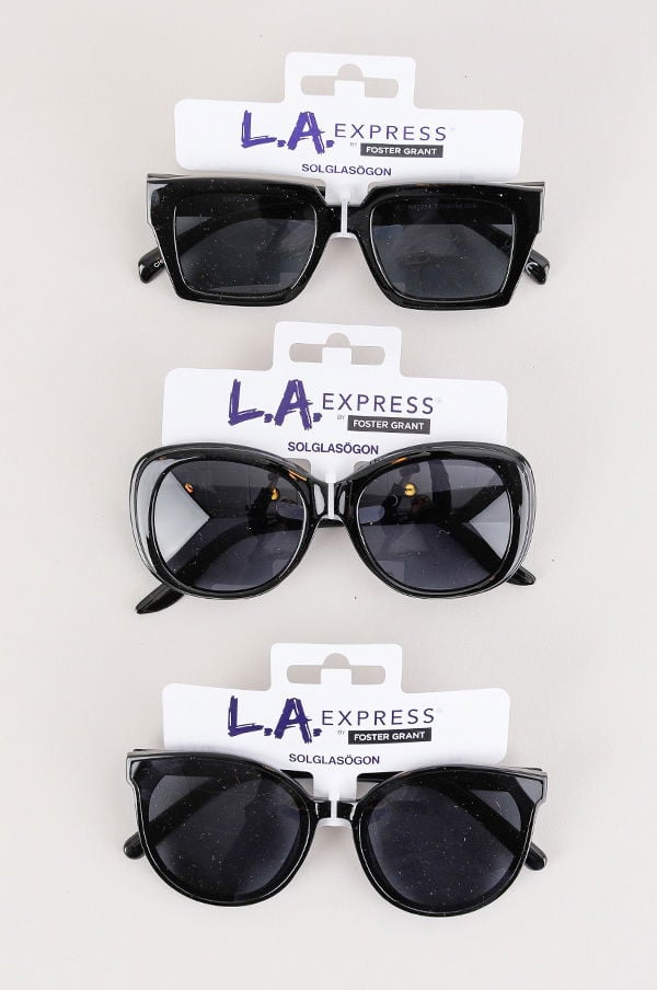 Tre par svarta solglasögon från L.A. Express, med olika stilar, på förpackning. Perfekta för soliga dagar och modeaccessoarer.